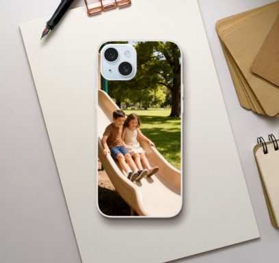 Photo Phone Case Two children sliding down a playground slide in a sunny park setting.