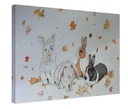 Rabbit Canvas Four rabbits of different breeds surrounded by colourful autumn leaves.